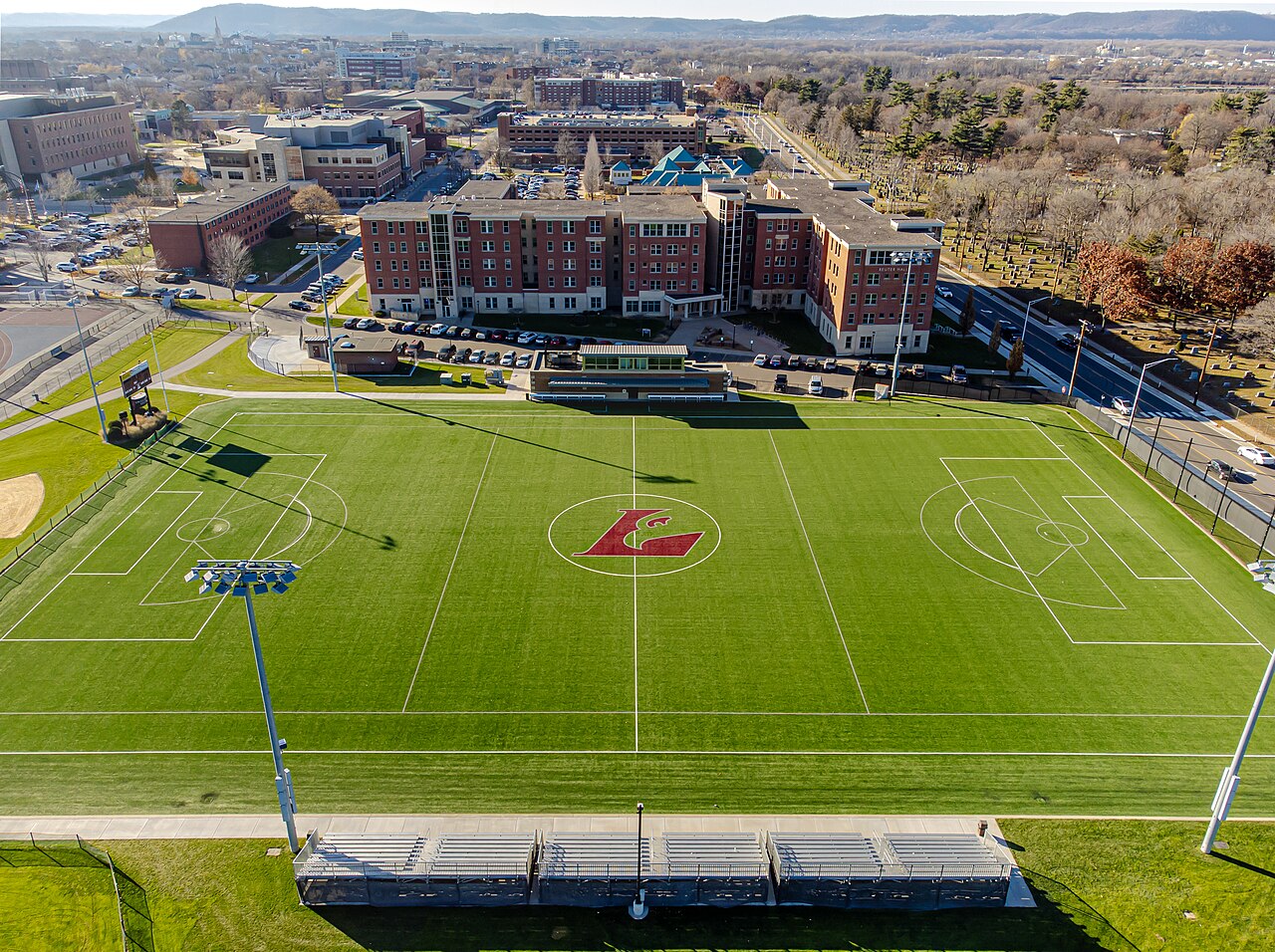 An aerial view of a lined multi-sport field complex